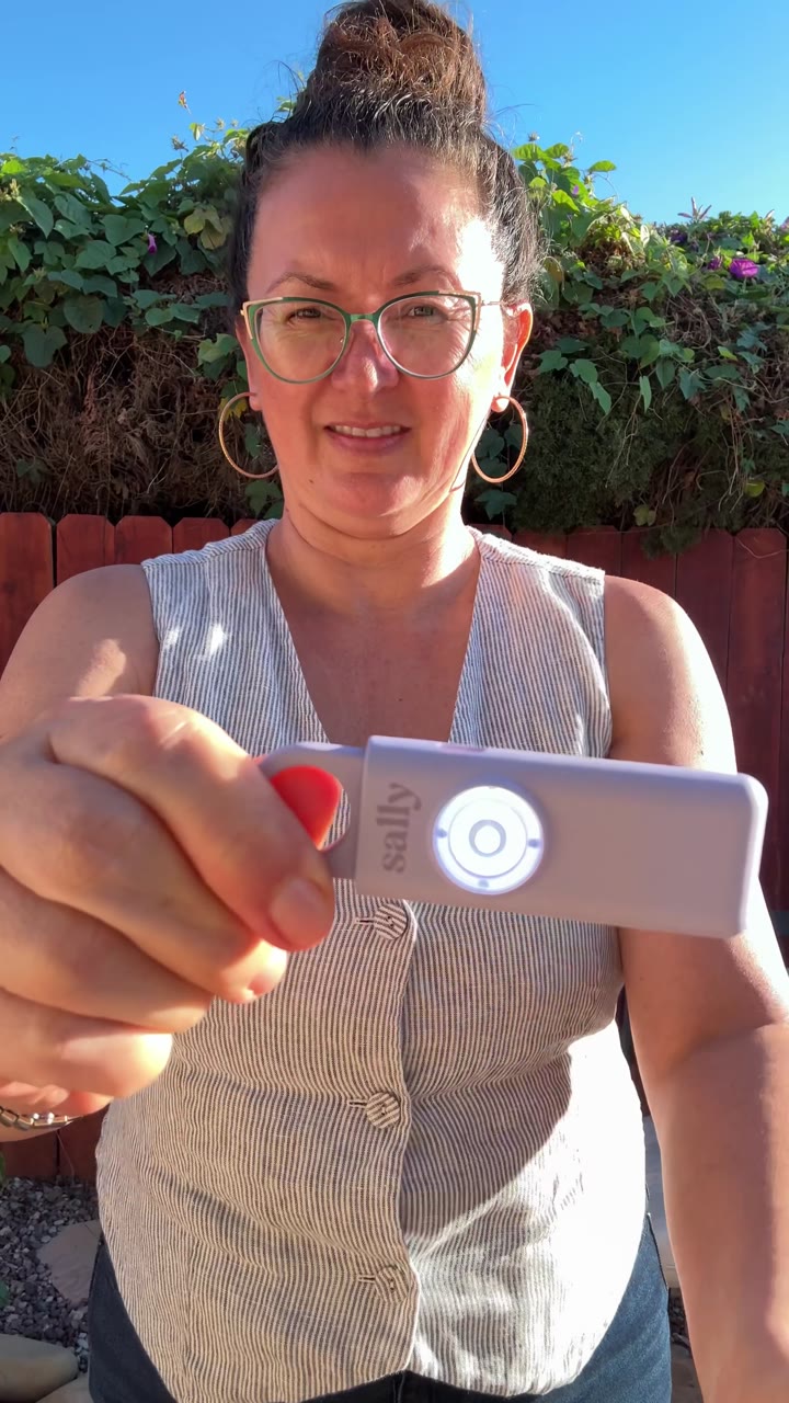 Woman holding Sally up to the camera